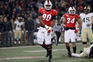 A Hilltopper celebrates while his friend kicks the crap out of an Army player.