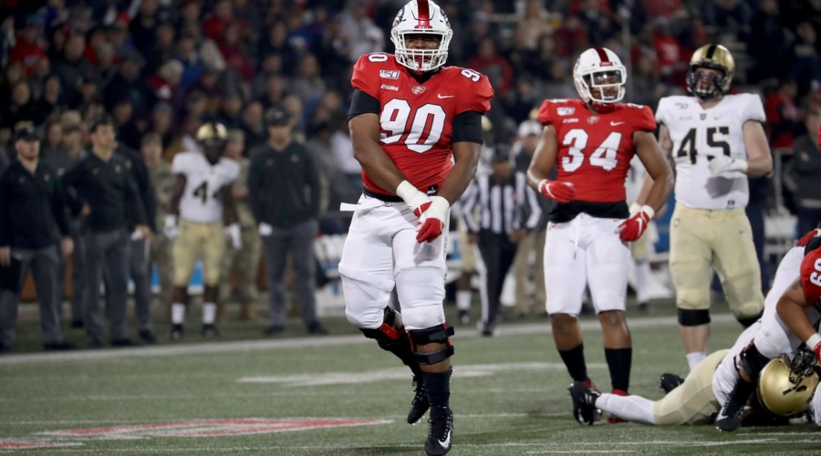 A Hilltopper celebrates while his friend kicks the crap out of an Army player.